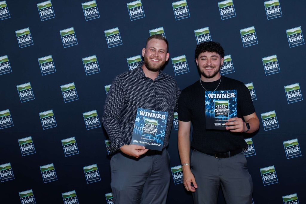Dan DeLuke, left, Social Media Coordinator and Vinny Ward, Right, Sales Consultant accepting the awards for Best New Car Dealer and Best Salesperson!
