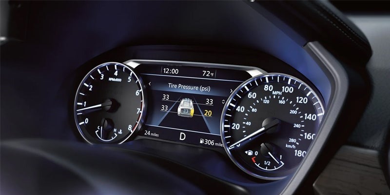 Interior image of 2024 Nissan Altima with Altima's touch-screen display and steering wheel
